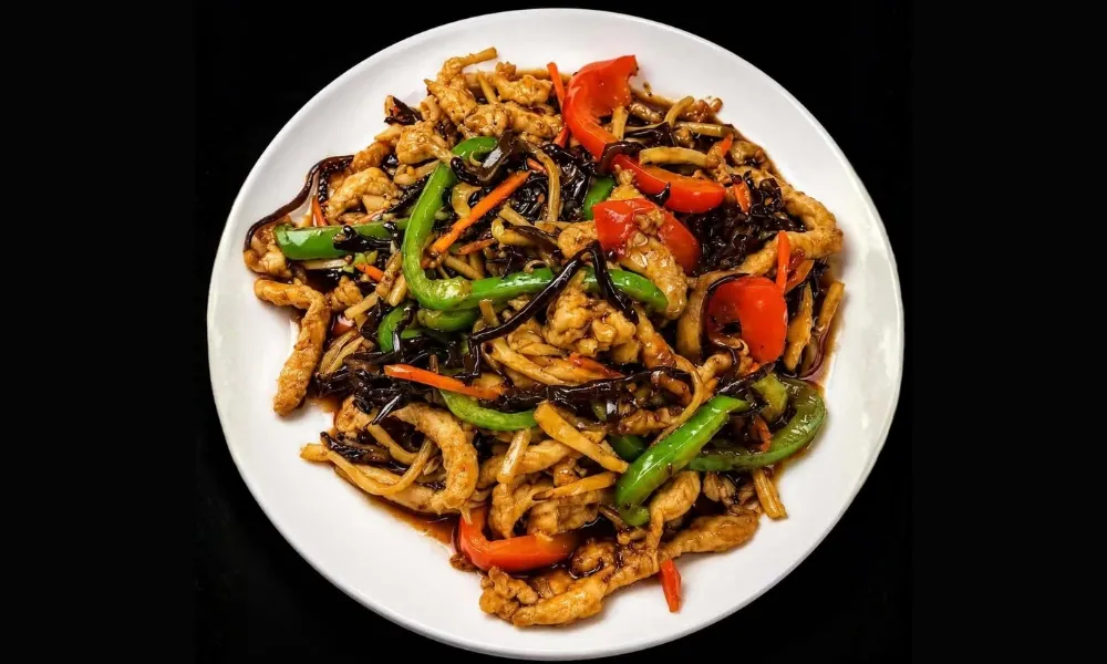 Stir‑fried shredded pork with colorful mixed vegetables
